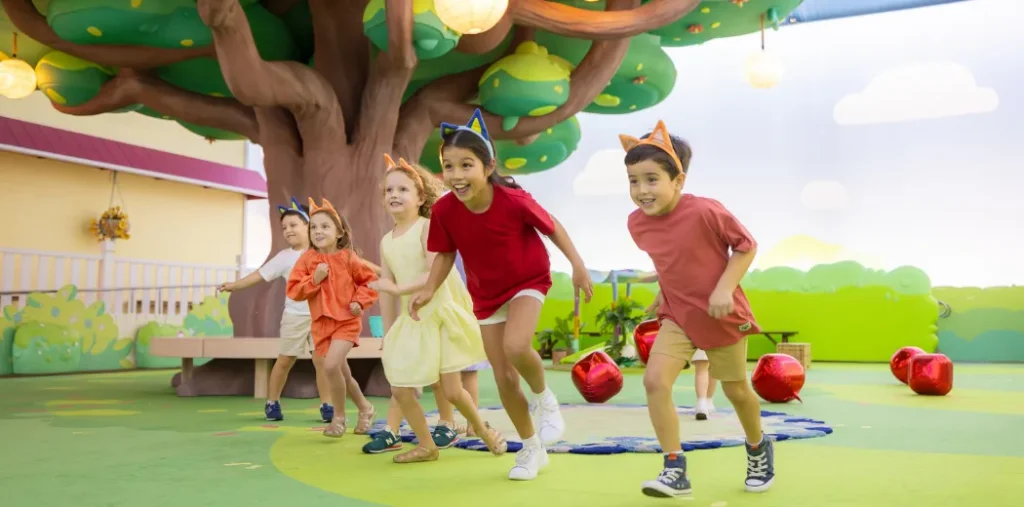 Kids running in Backyard at Bluey's World
